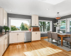 Huge windows to take in the view while you cook, eat or entertain. A second sink, acres of counter space and second dishwasher make prep and cleanup a breeze.
