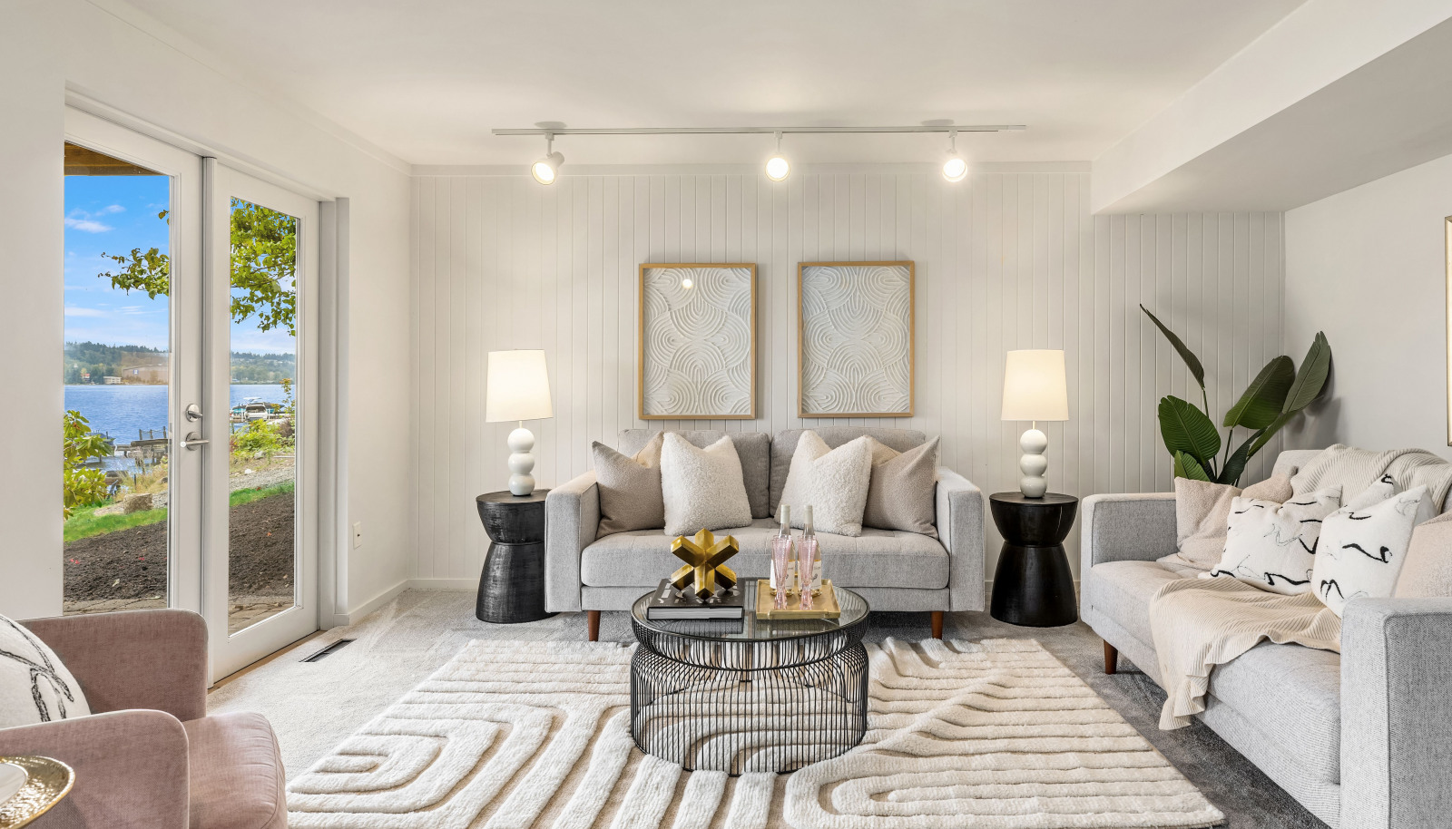 The family room on the lower floor is spacious and bright. Did I mention the lake view?