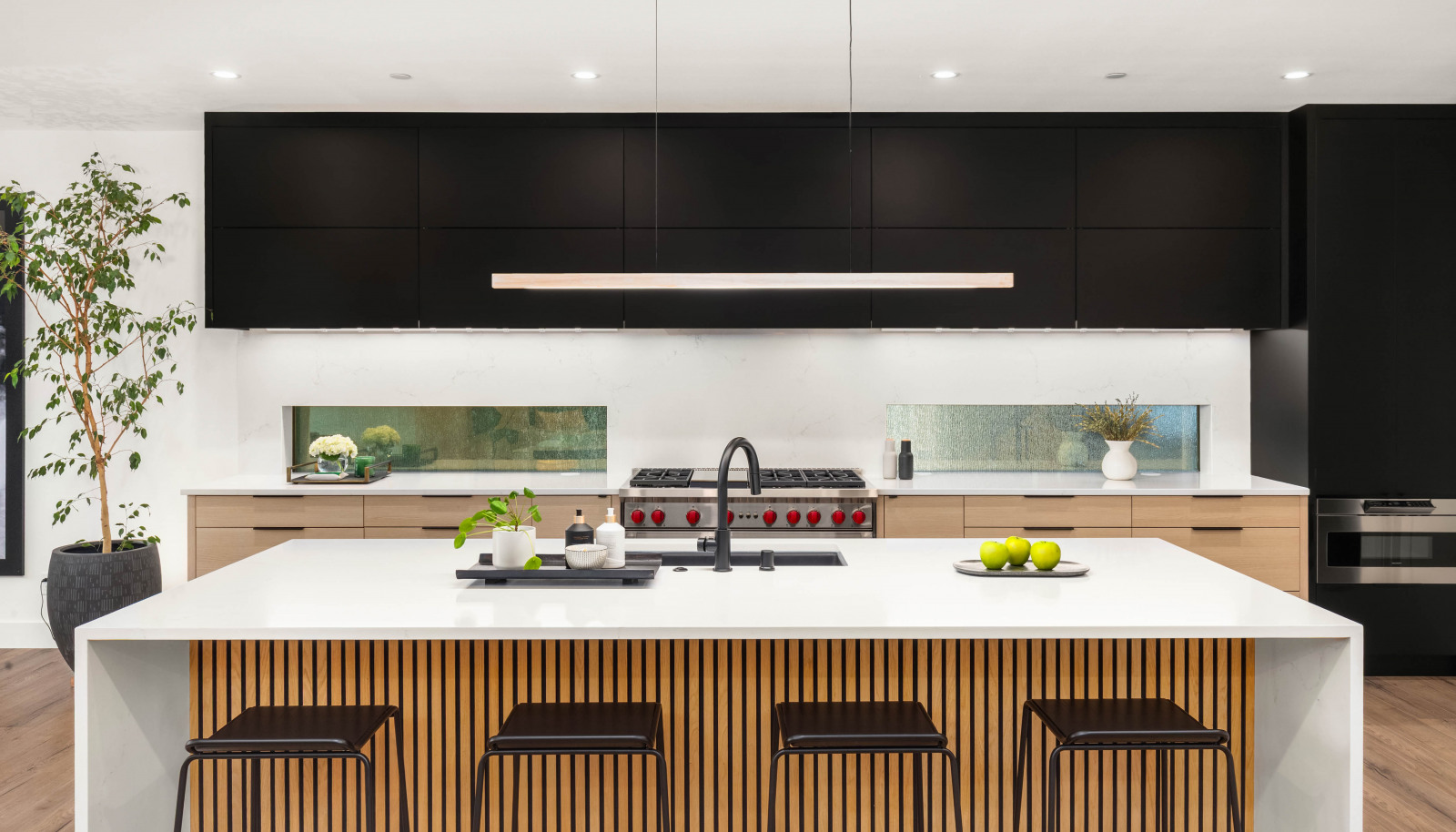 The gourmet kitchen is outfitted with Wolf and Sub-Zero appliances.