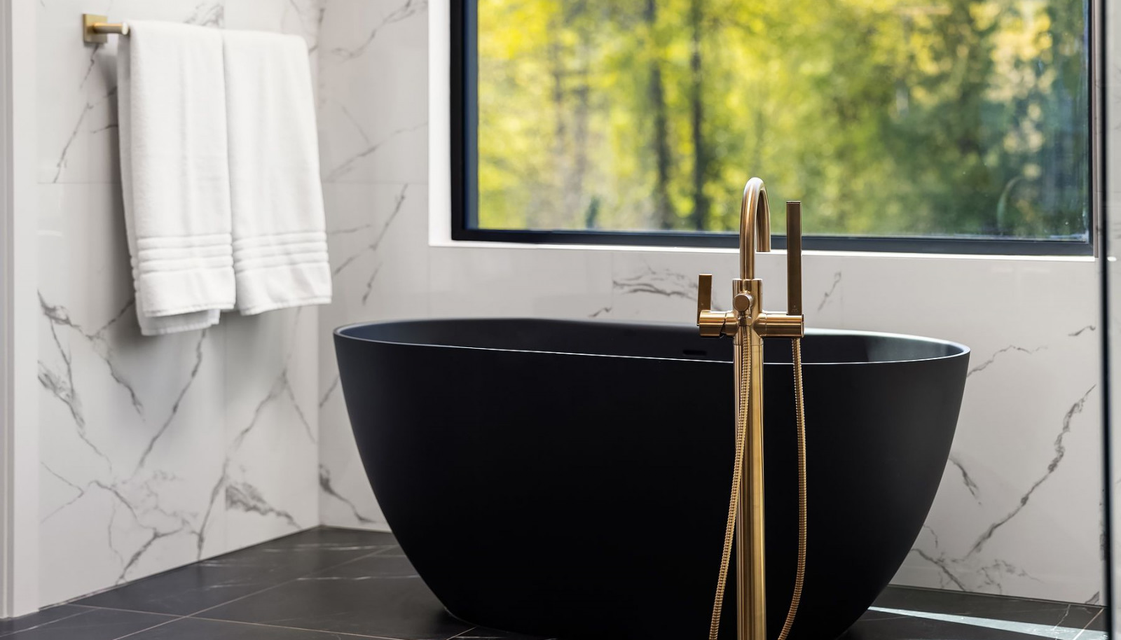 Photo of adjacent, completed home (lot 3) Primary bathroom tub - for representation purposes only.