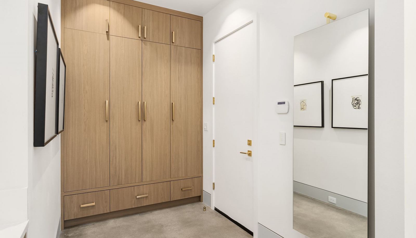 Photo of adjacent, completed home (lot 3) Mudroom - for representation purposes only.