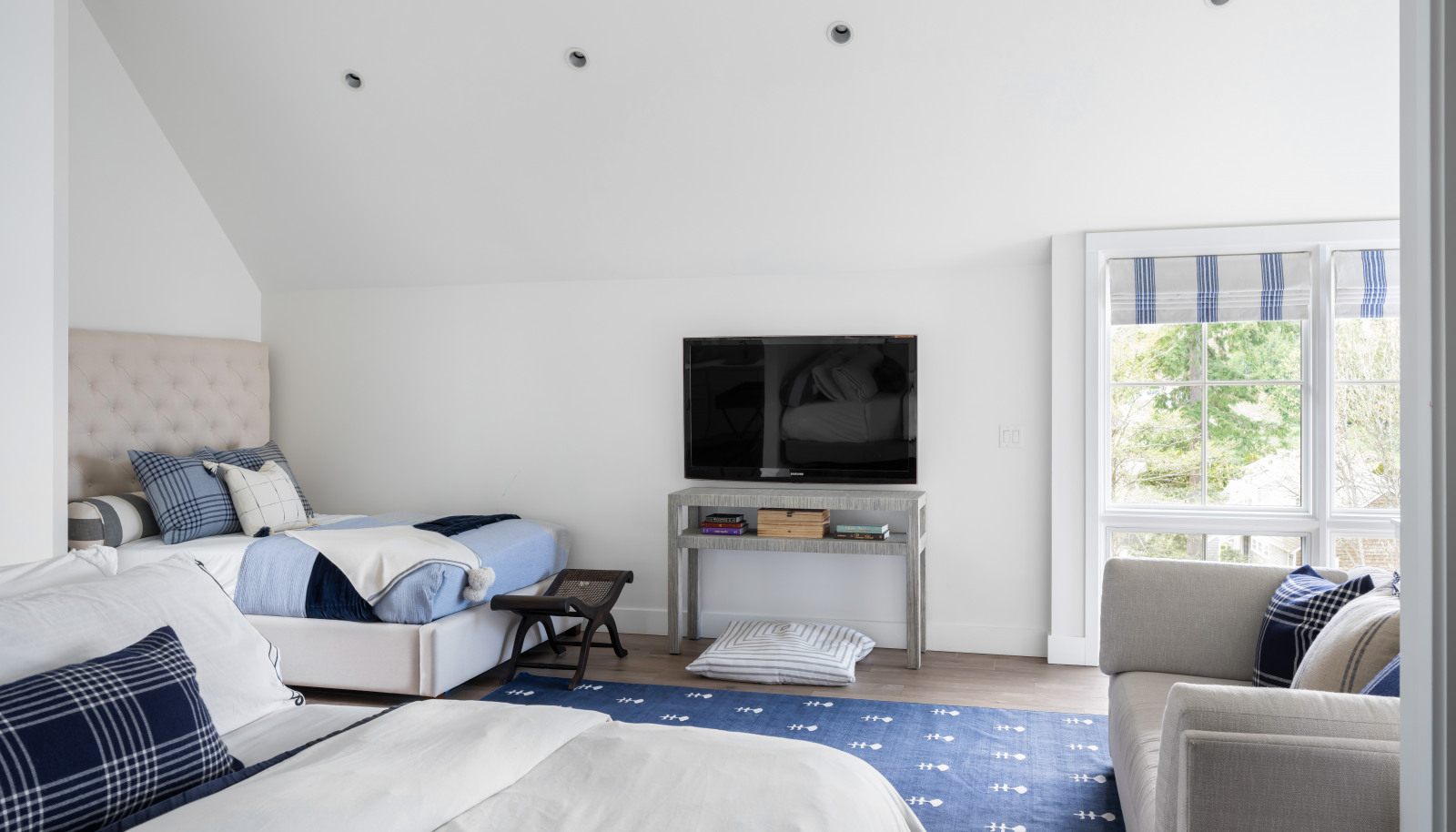 The second primary suite, located in its own private wing and accessed by a private staircase