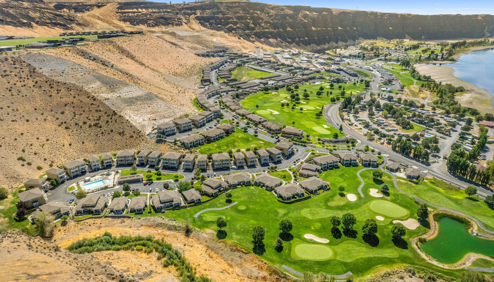 Aerial view of the property and surrounding amenities