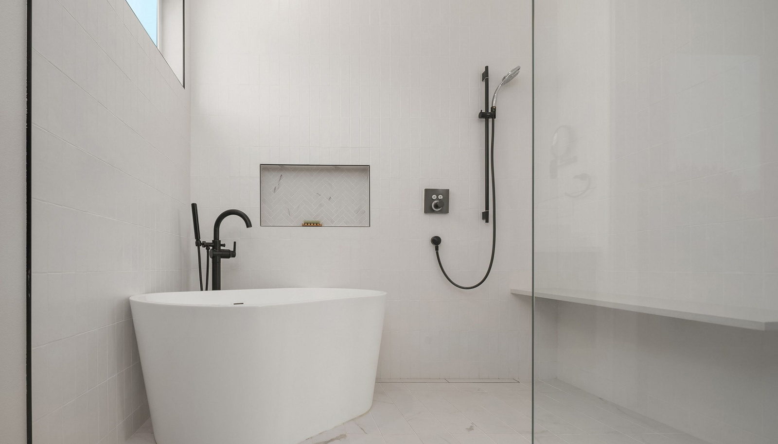 Wet bath in the primary bathroom shower