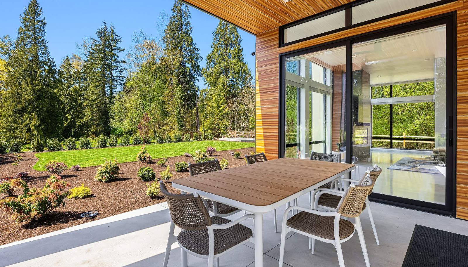 Photo of adjacent, completed home (lot 3) covered patio - for representation purposes only.