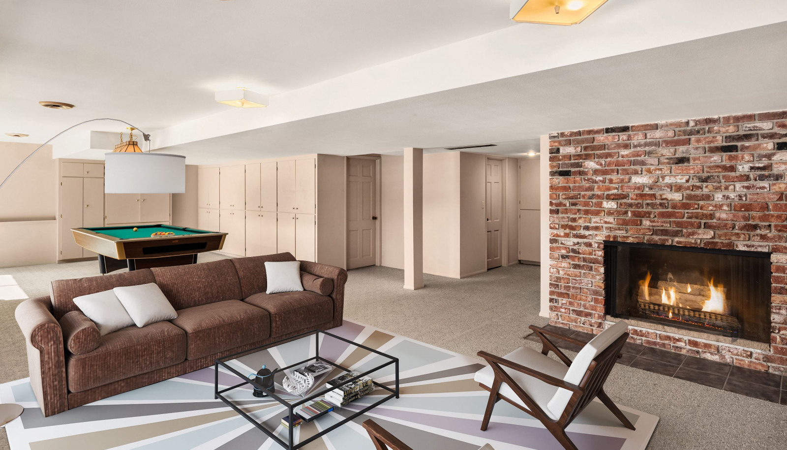 The large downstairs space is ideal for all your needs, whether it's a home theater, gym, or entertainment area, offering endless possibilities.