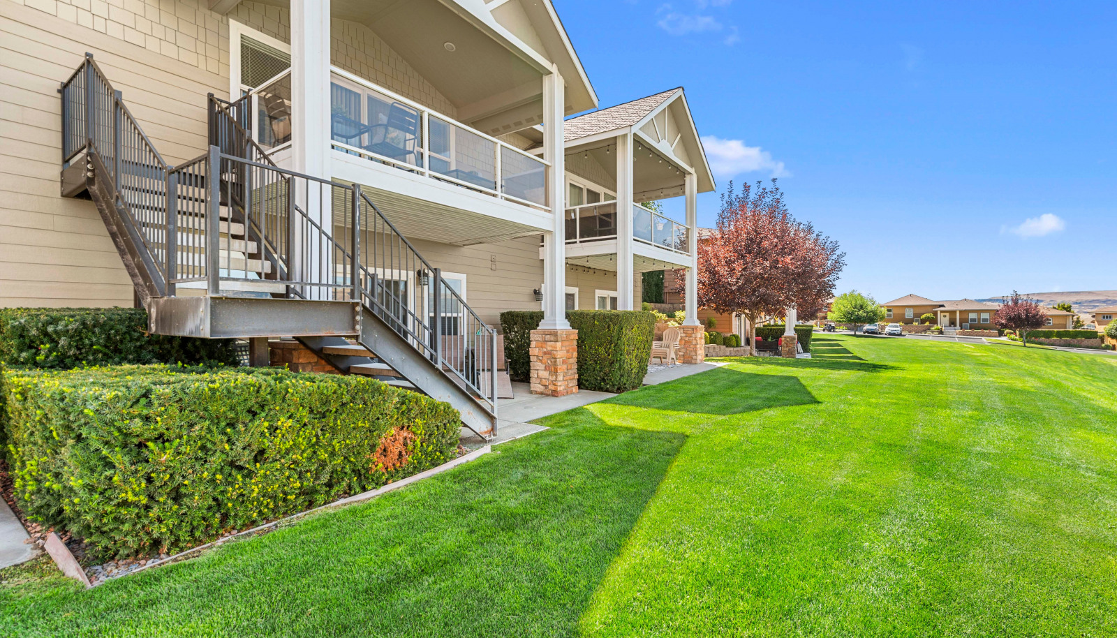 Lush lawn and mature landscaping