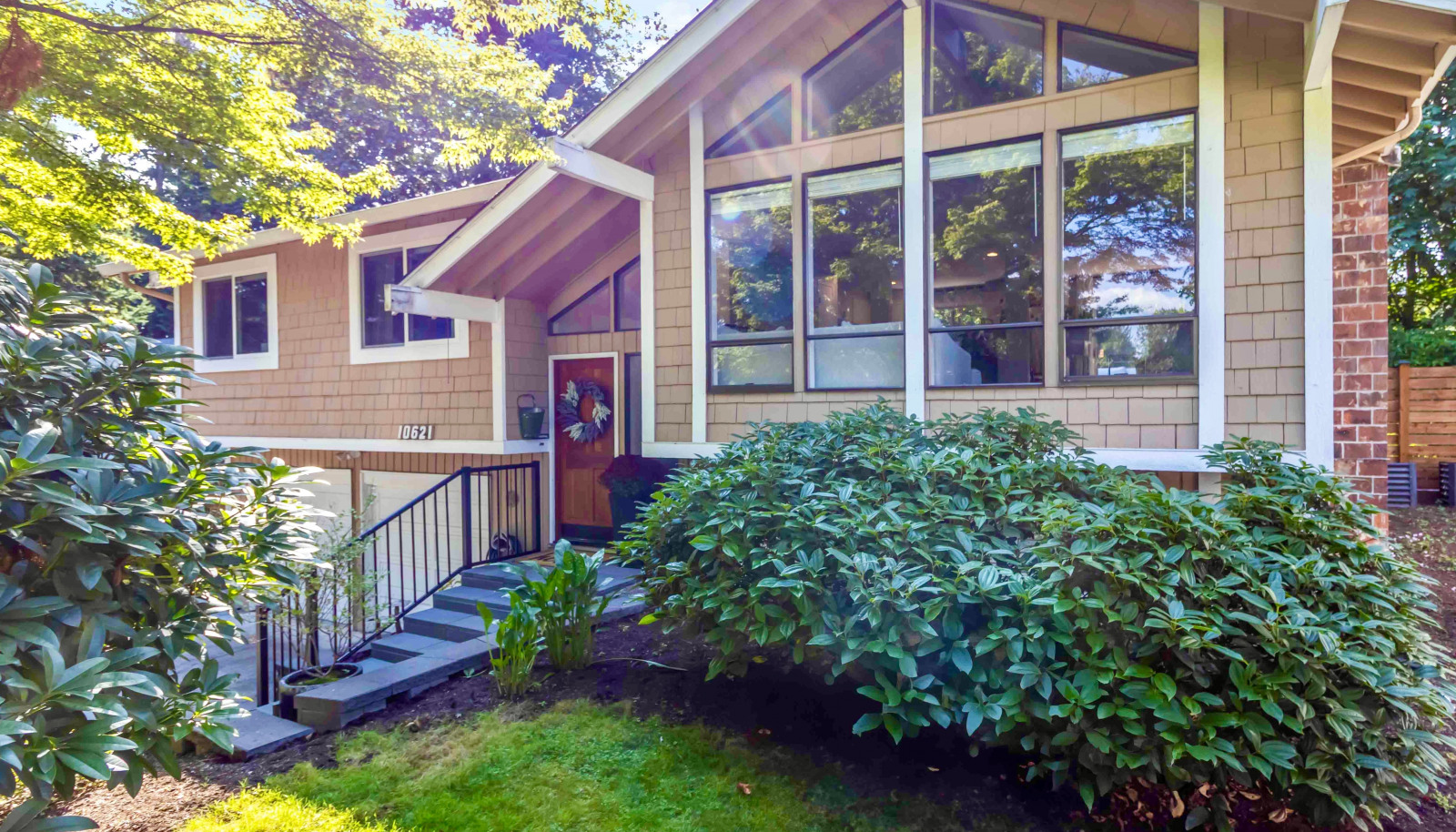 Beautiful light filled home with large windows and private yard.