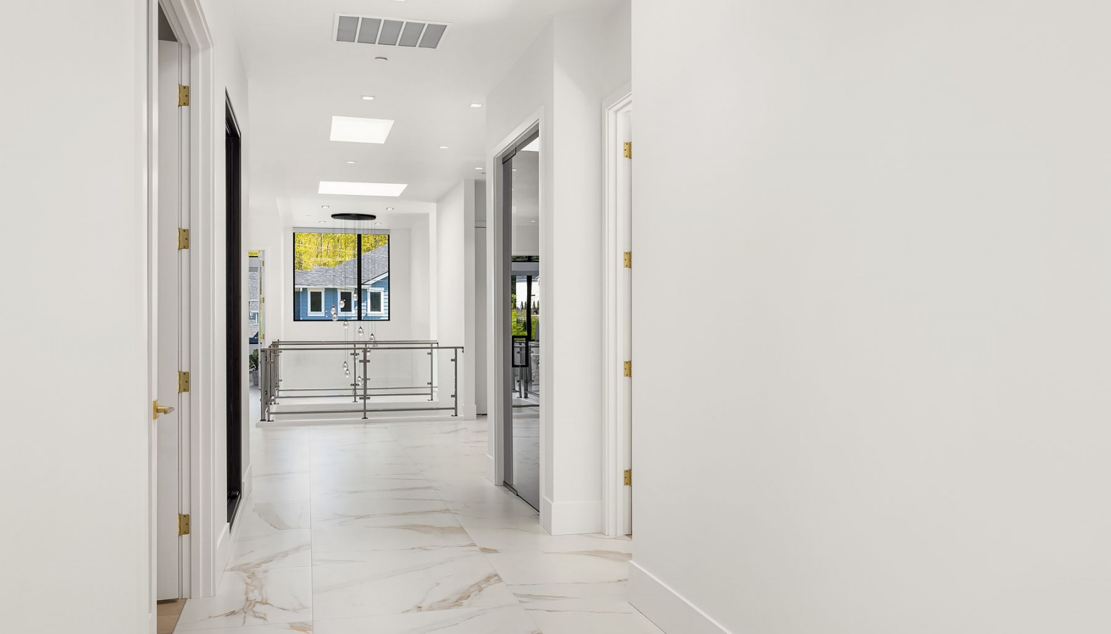 Photo of adjacent, completed home (lot 3) upper hallway - for representation purposes only.