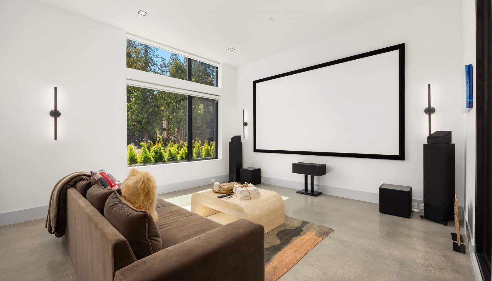 Photo of adjacent, completed home (lot 3) main floor media room - for representation purposes only.