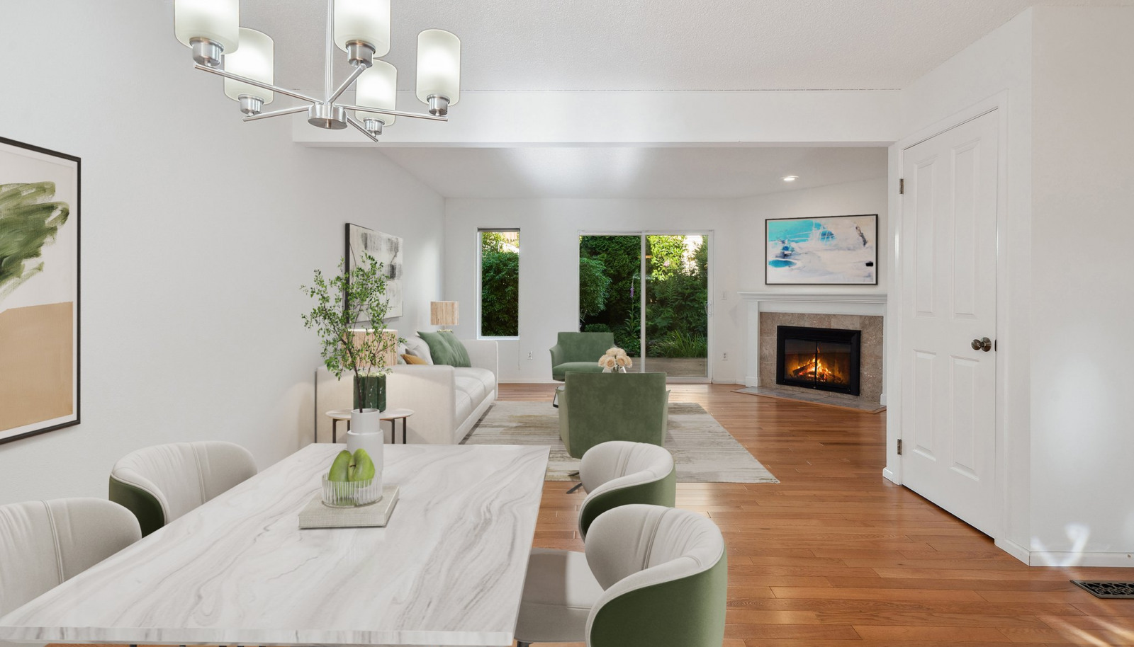 Dining area off kitchen with gleaming wood floors - Virtually staged to give you a sense of the potential! Fresh paint makes this move in ready!
