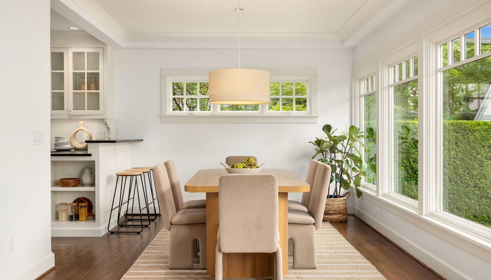 The dining room is open to the living room and the kitchen. Modern living!
