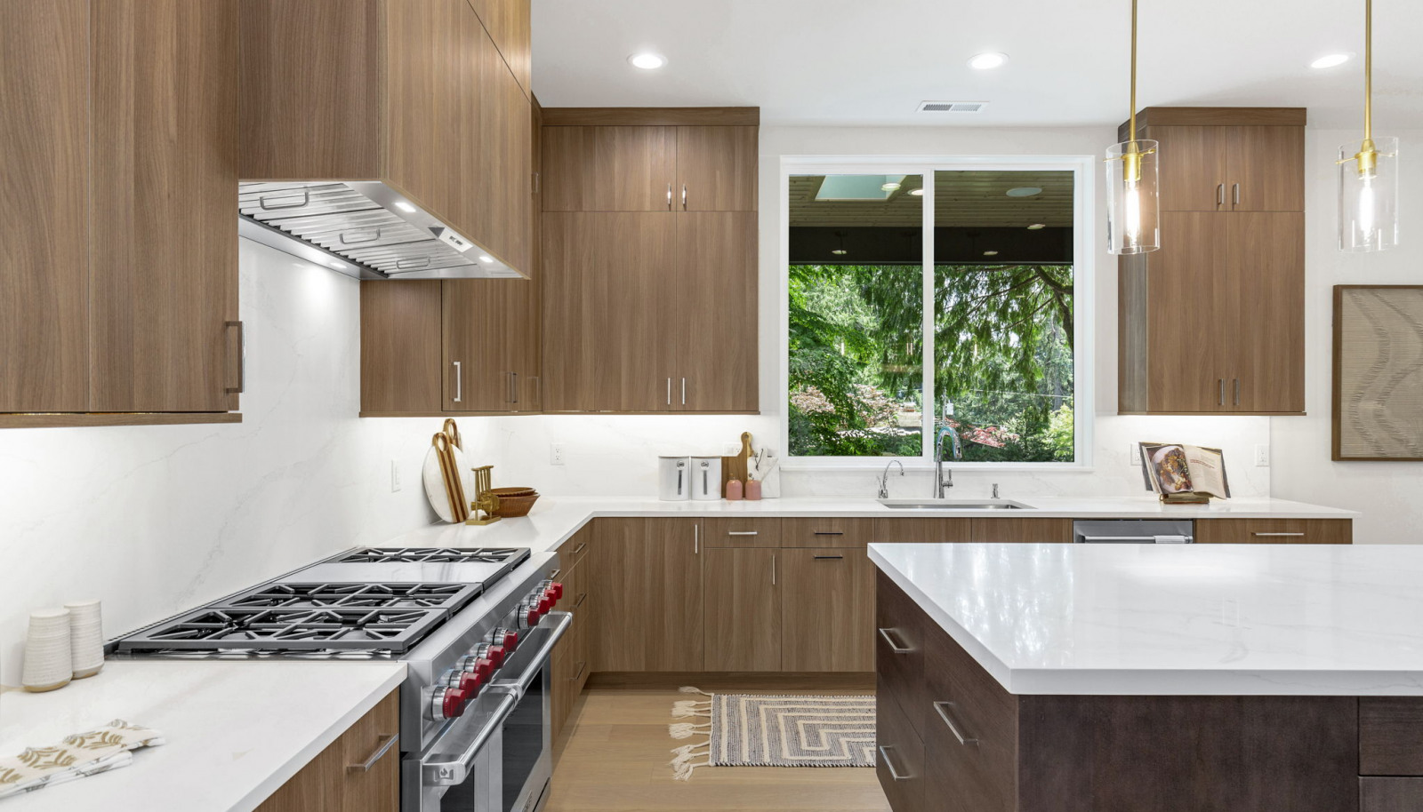 Striking full-slab backsplash seamlessly connected to the countertop pattern.