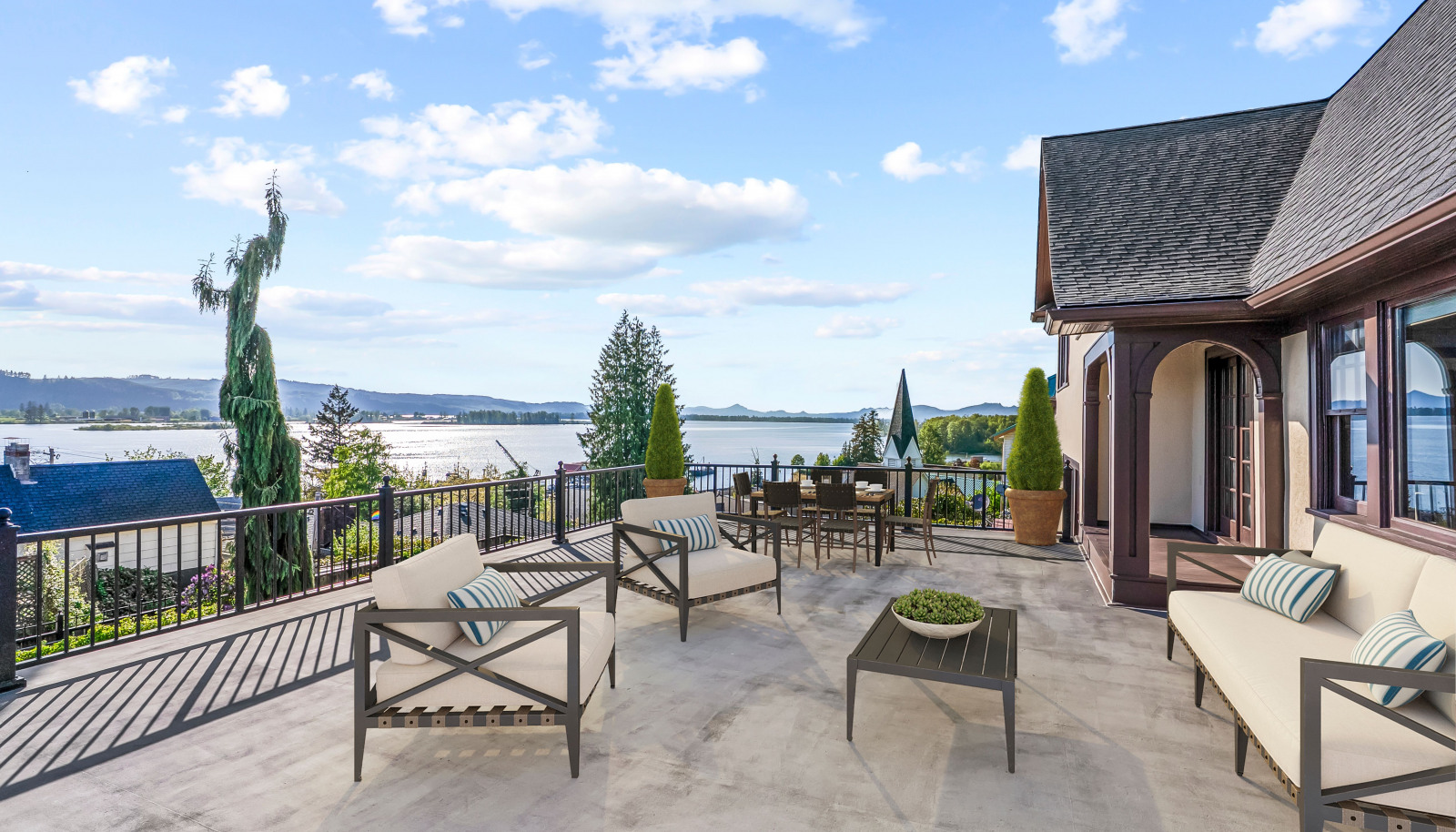 Expansive deck overlooks the Columbia River and Puget Island. Note: Deck virtually staged