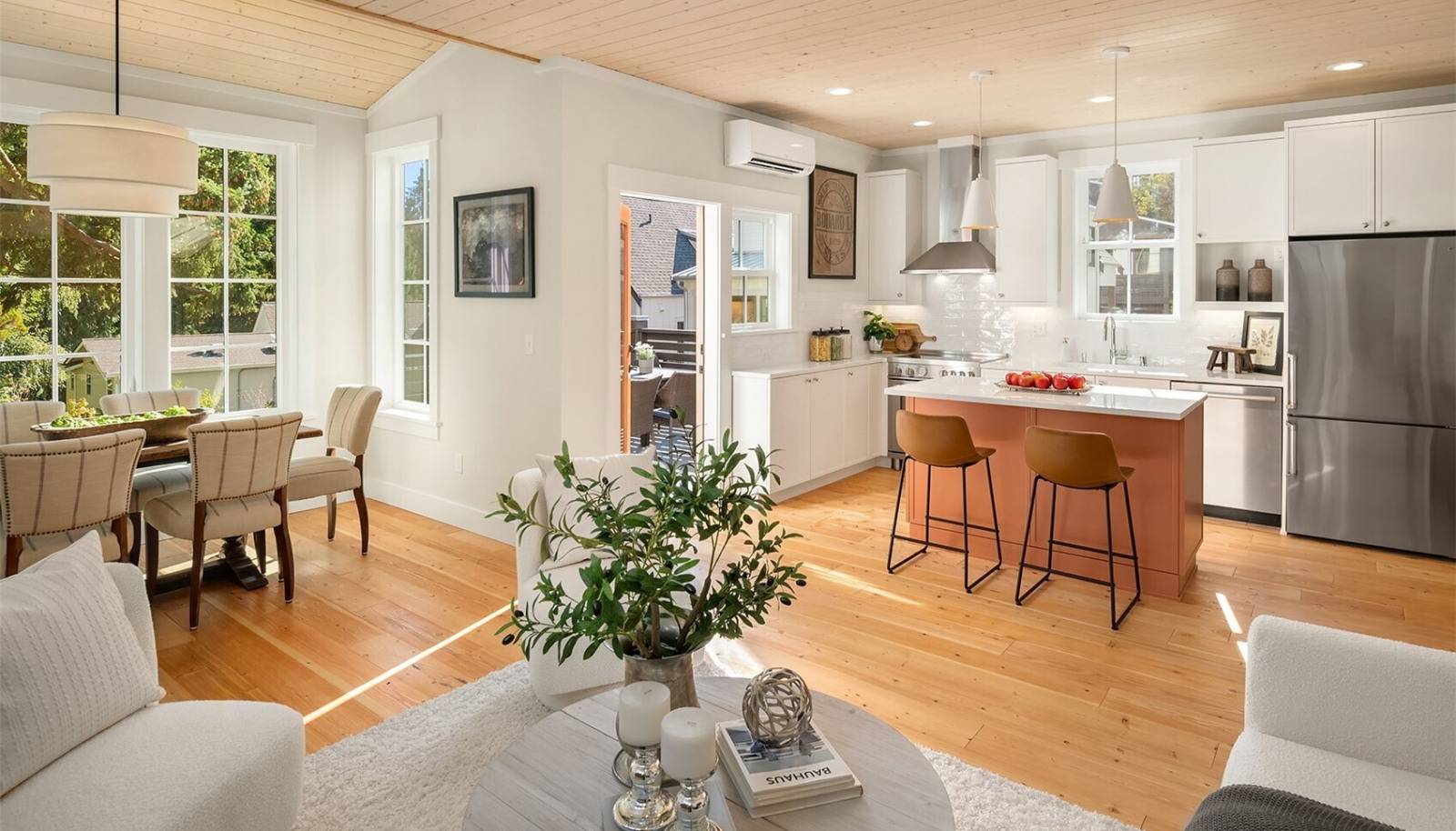 A gracious open floor plan provides comfortable living spaces warmed by the stained wood paneled ceilings. A gracious open floor plan provides comfortable living spaces warmed by the stained wood paneled ceilings.