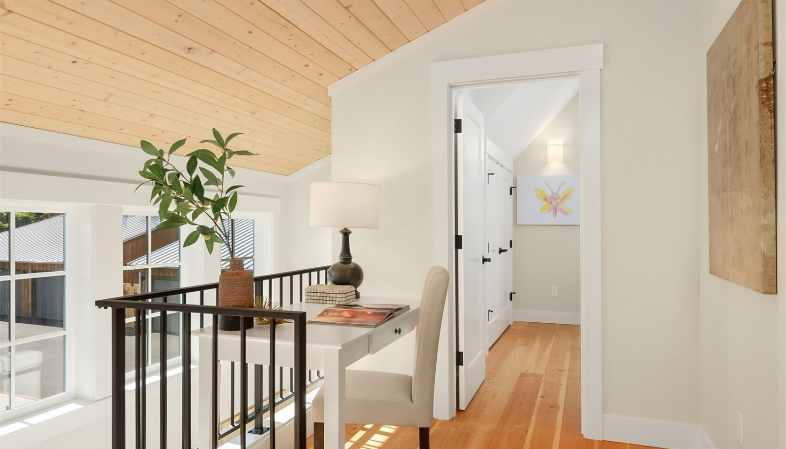 Explore the upstairs spaces and find a custom work space at the top of the stair landing. Solid wood flooring graces the upstairs bedroom spaces. Explore the upstairs spaces and find a custom work space at the top of the stair landing. Solid wood flooring graces the upstairs bedroom spaces.