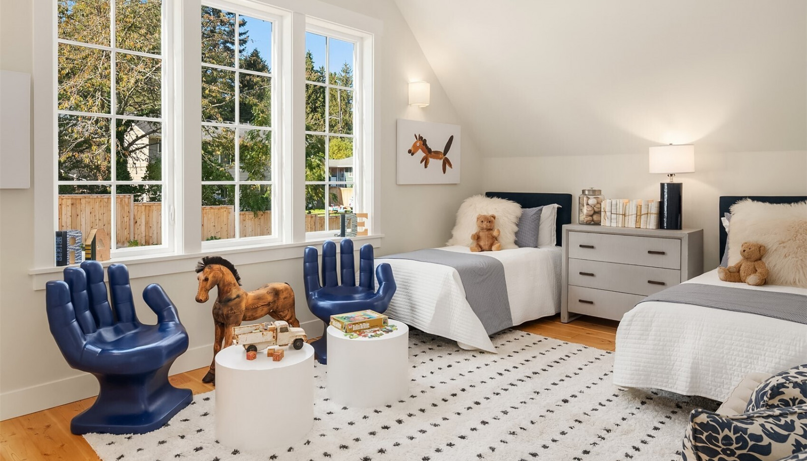 The second of two upstairs vaulted ceiling bedrooms is filled with light from it's westerly exposure. The second of two upstairs vaulted ceiling bedrooms is filled with light from it's westerly exposure.