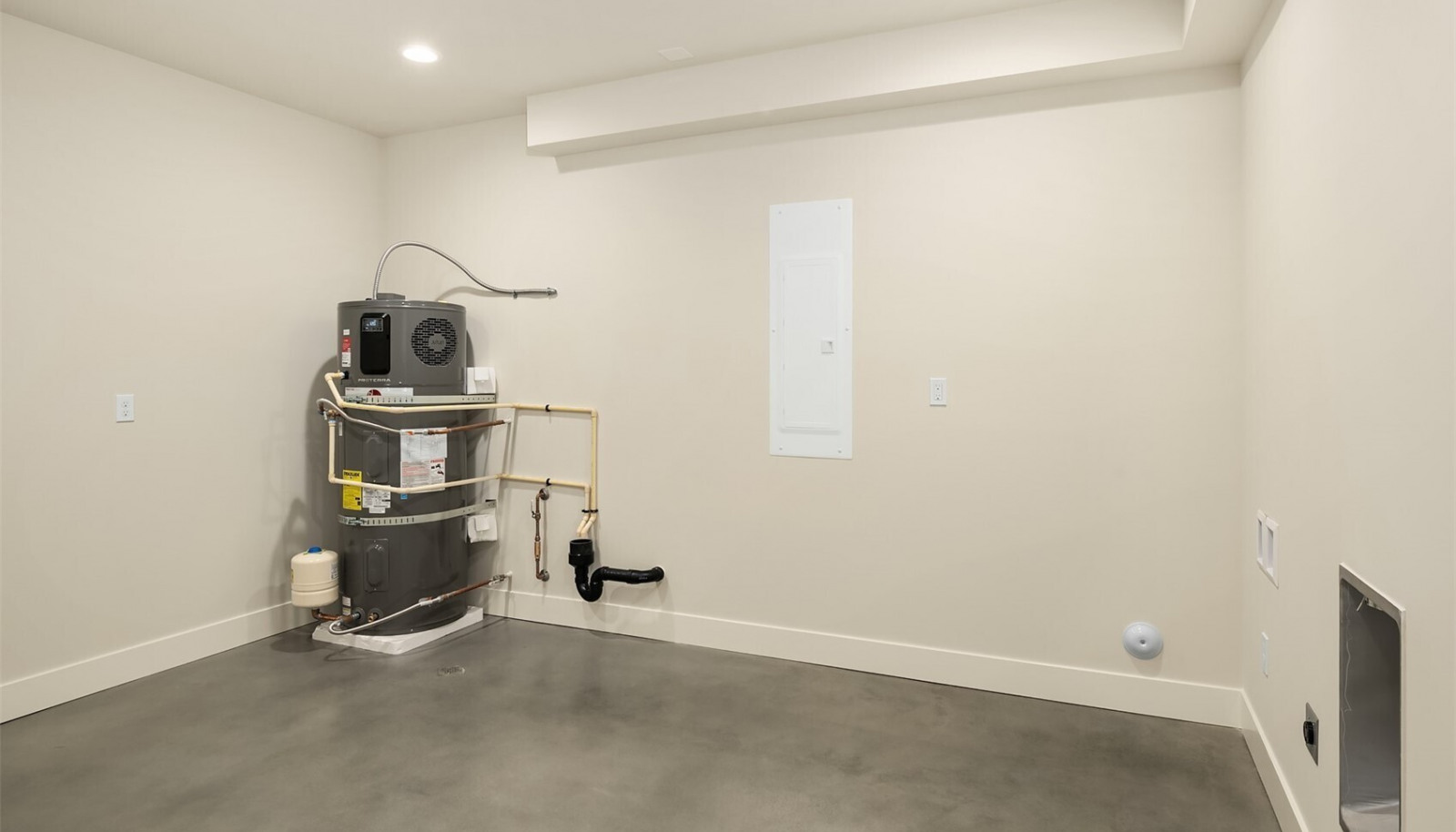 The lower level includes a very large utility storage space with room for a washer/dryer and lots of storage! The lower level includes a very large utility storage space with room for a washer/dryer and lots of storage!