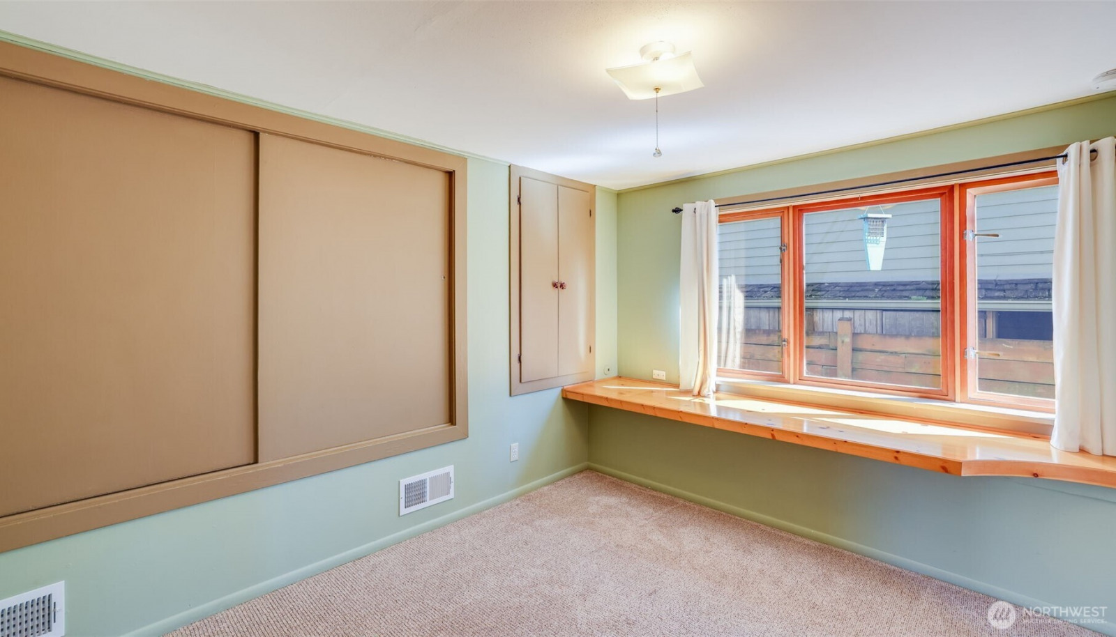 Downstairs: Bedroom with built-in desk. Downstairs: Bedroom with built-in desk.