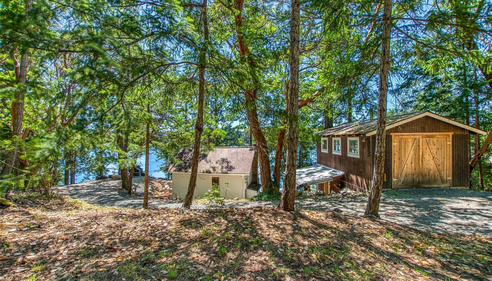 Two vintage cabins on a half acre lot. Two vintage cabins on a half acre lot.