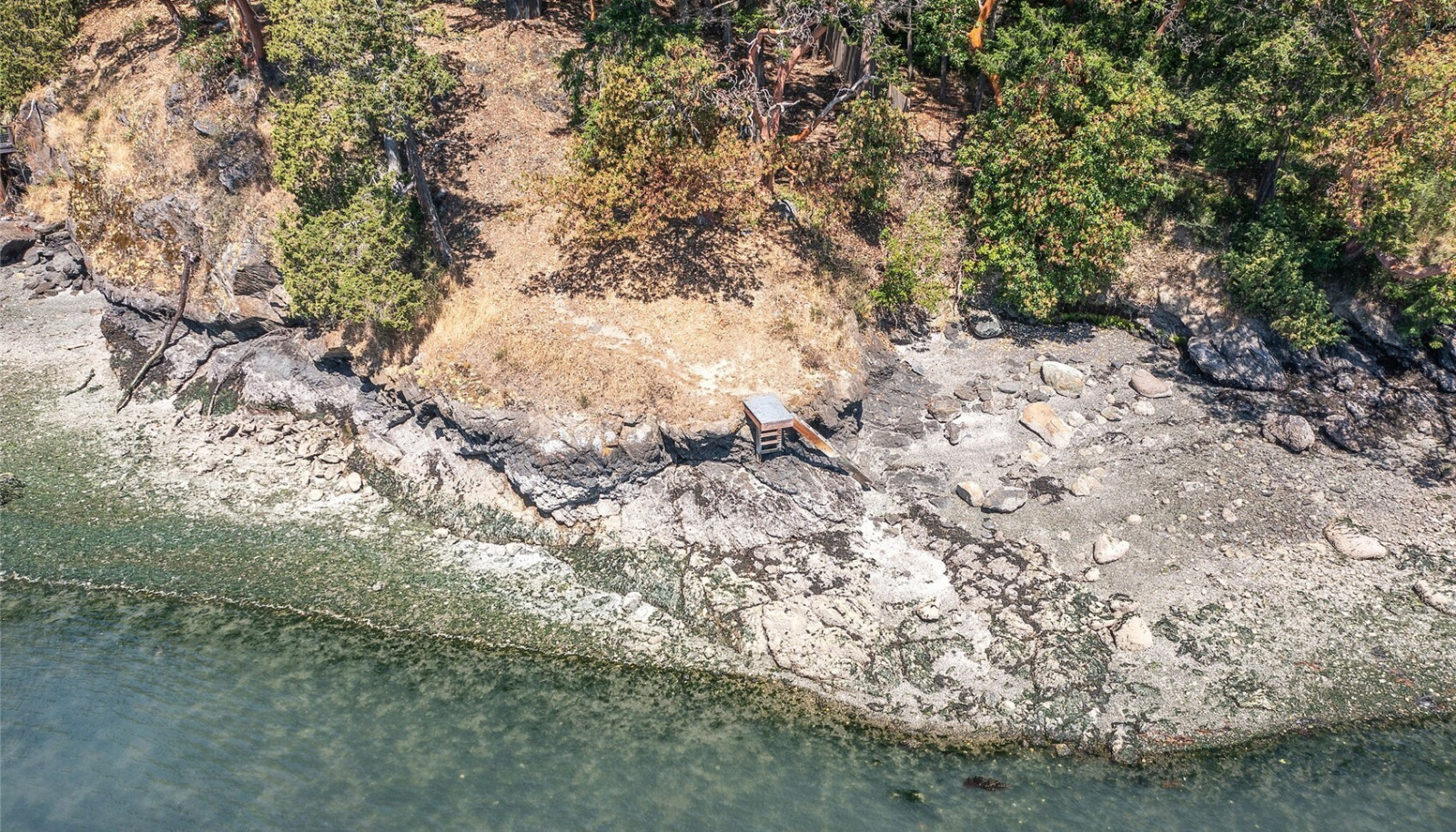 Stairs to the rocky shoreline. Stairs to the rocky shoreline.
