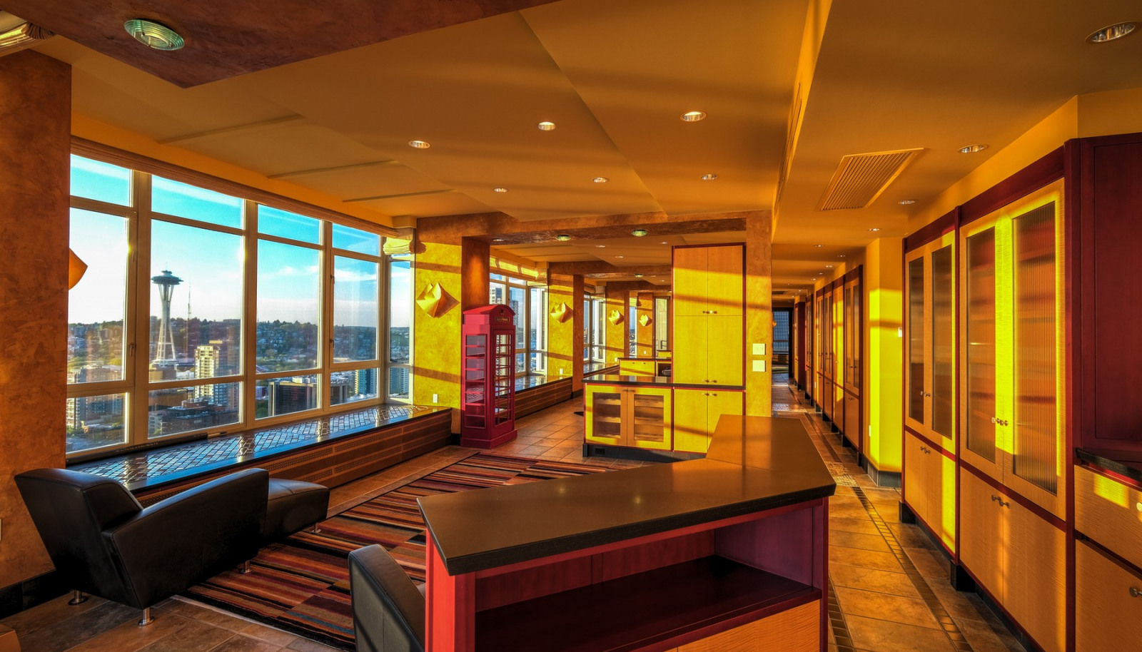 This full half of a floor interior is anchored by the view.