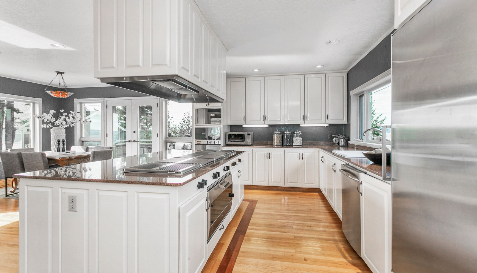 Spacious chef's kitchen was designed for entertaining. Full size Sub Zero refrigerator and matching full size Sub Zero freezer, lots of counter space, two sinks, large pantry and storage galore.