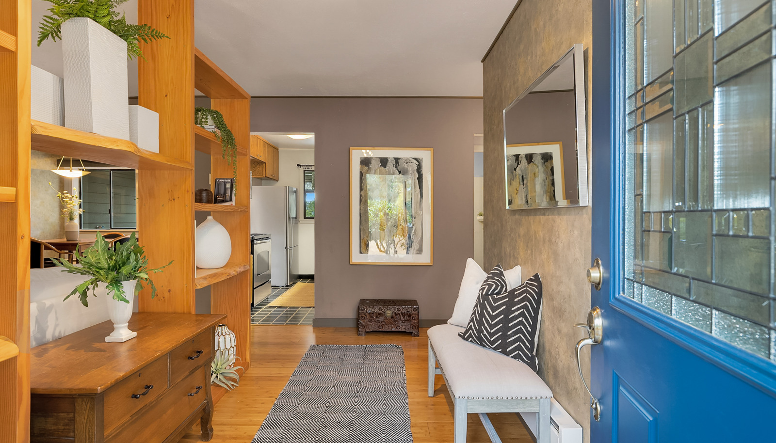Entry Hall with kitchen beyond.
