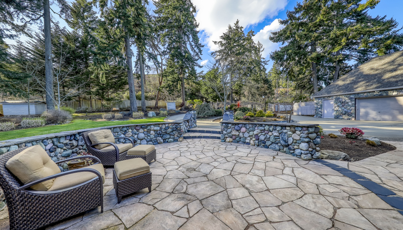 Beautiful shot looking back at the gated and fully fenced front yard.. notice the privacy and usability this property has to off