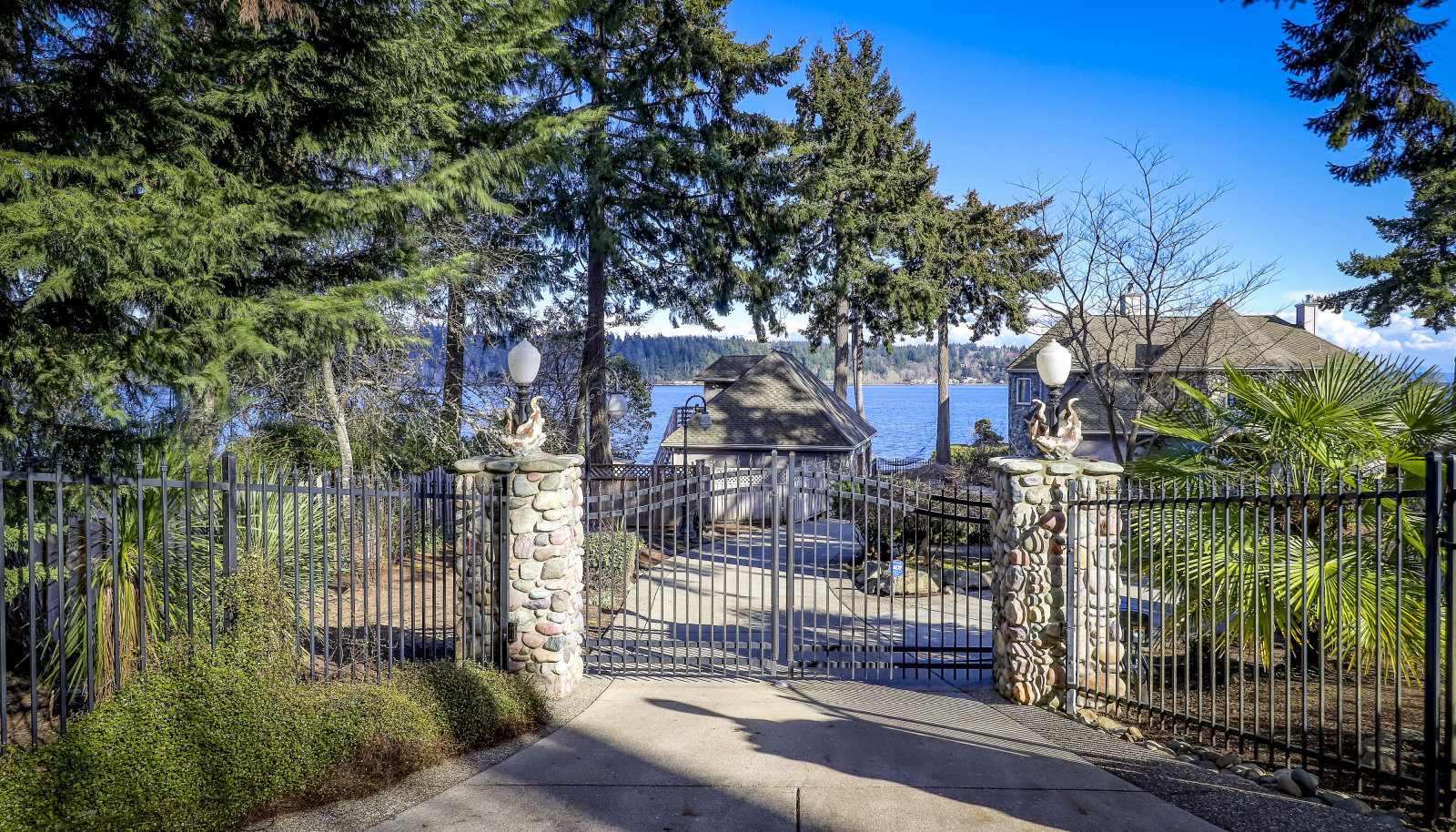 End of the road privacy and peace and quiet on legendary Watauga Beach Drive...gated and fully fenced entry.