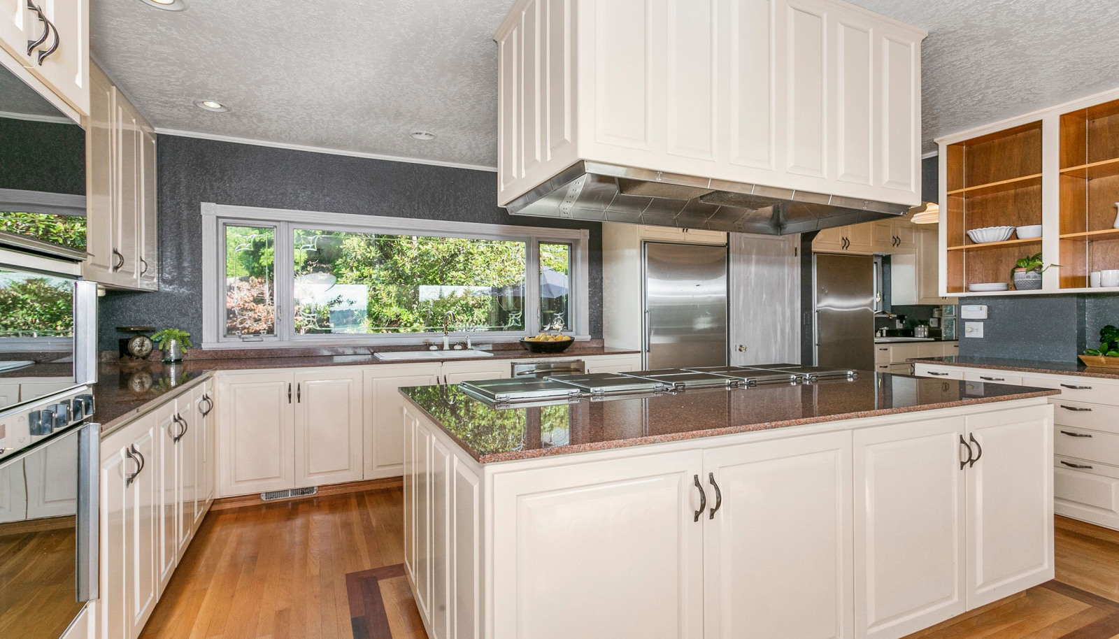 Kitchen features 5 cooktop Gaggenau stove, Gaggenau double ovens, separate Sub Zero refrigerator and Sub Zero freezer, storage galore.