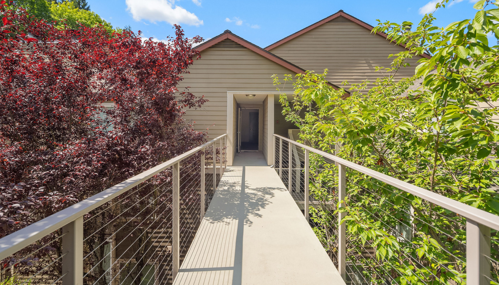 New railing with contemporary wiring welcomes you.