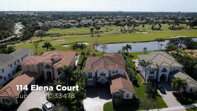 Coveted, Customized Jupiter Country Club Home on Prime Lot with Over 1/3 Acre with Captivating Lake, Golf Course & Nature Views!