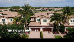 Breathtaking Lake Views from this Prime Waterfront Townhome in the Luxury Gated Community of the Jupiter Country Club!