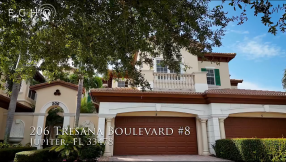 Breathtaking Views from this Exceptional Single-Story Carriage Home in the Prestigious Jupiter Country Club