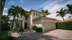 Breathtaking Lake, Golf, & Preserve Views From this One-of-a-Kind Home in the Prestigious Jupiter Country Club