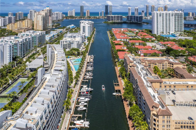 One-of-a-Kind waterfront corner residence in the Heart of Aventura!