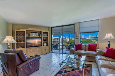 Spacious living room with views of Country Club Drive