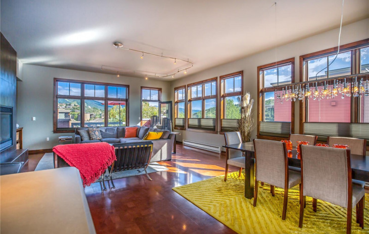 Living area with balcony in background