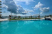 Renovated pool with waterfront view.