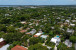 Aerial views of this exquisite villa with private guest house, pool and outdoor amenities to enjoy with family & friends.