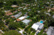 Aerial views of this exquisite villa with private guest house, pool and outdoor amenities to enjoy with family & friends.