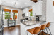 Discover a newly updated kitchen featuring sleek stainless steel appliances and dining service for 10. Enjoy the convenience of both Keurig and filter coffee options in this fully equipped culinary space.