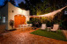 Sip cocktails pool side while enjoying the romantic sunset among friends and family
