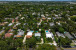 Aerial views of this exquisite villa with private guest house, pool and outdoor amenities to enjoy with family & friends.