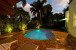 Sip cocktails pool side while enjoying the romantic sunset among friends and family