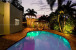 Sip cocktails pool side while enjoying the romantic sunset among friends and family