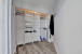 Primary bedroom walk-in closet