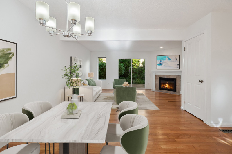 Dining area off kitchen with gleaming wood floors - Virtually staged to give you a sense of the potential! Fresh paint makes this move in ready!