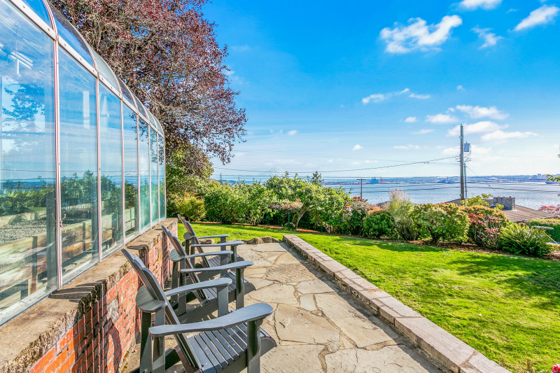 View from side yard to Commencement Bay and breathtaking Mount Rainier (looms large on a clear day)!